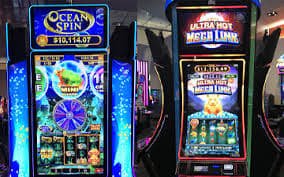 Filipino player accessing Casino GCash slot games on a mobile phone in Manila